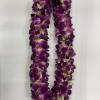 Purple orchid lei on a white background