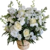 White roses and chrysanthemums arranged in a woven basket