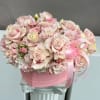 Pink and white rose bouquet in a pink heart-shaped box