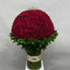 Large dome of red roses topped with a small crown