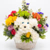 Colorful flower basket with a white plush dog face in the center