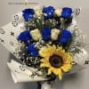 Bouquet of blue and cream roses with a sunflower