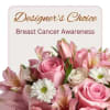 Pink roses and white daisies in a breast cancer awareness bouquet