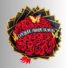 Bouquet of red roses with a black and gold wrap and a Spanish banner
