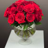 Bouquet of red roses in a clear glass vase