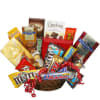Basket of assorted candy bars and chocolates with red ribbon
