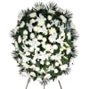 White floral standing spray on an easel