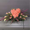 Heart-shaped bouquet of peach roses with pink calla lilies