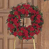 Red rose wreath on a stand