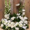 Mix all white flowers roses orchids mums and more 

If you want