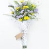 Yellow pom pom, purple statis and lush garden greenery bouquet.