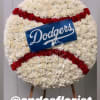 Large floral baseball display with a Dodgers sign