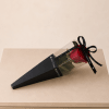 A bold and elegant choice, this rose comes beautifully packaged in a