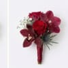 Red rose and orchid boutonniere with burgundy wrap