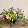 Mixed pastel bouquet in a square glass vase