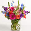 A fresh-from-the-meadow design makes this colorful bouquet a true delight. Orange roses