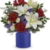 Revel in the crisp, classic color scheme of pristine white lilies and