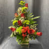 Beautiful fresh roses in a glass vase.