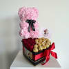 Pink rose teddy bear with red roses and gold chocolates in a heart-shaped box