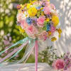 A playful and elegant lollipop-style floral arrangement designed to stand out. This