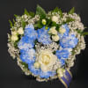 Blue and white floral wreath with roses and baby's breath