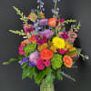 Send an arrangement as colorful and vibrant as them! With purple stock