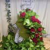 A unique and elegant horse-shaped floral design, created to honor a loved