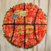 Round orange carnation tribute with a Los Angeles Lakers sign