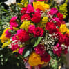 Bright mixed bouquet with red, pink, and yellow flowers