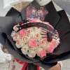 Spook her with this wrapped 3 doz long stem rose bouquet on