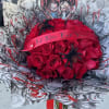 36 long stem roses decorated in a spooky bucho style 