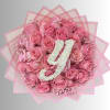 Pink rose bouquet with white floral initials on pink wrap
