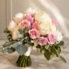 Pink and ivory rose bouquet with eucalyptus greenery