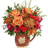 This autumn-inspired arrangement has orange roses, orange spray roses, red alstroemeria, orange