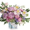Teleflora's Written In The Sky Bouquet includes lavender roses, lavender alstroemeria, pink