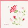 Quilled pink and red flowers with a bee on a white card reading Be Mine