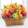 Basket of assorted fruit tied with a gold ribbon