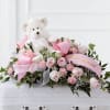The Touch of Sympathy Casket Spray is a sweet and elegant arrangement