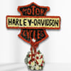 Harley-Davidson motorcycle tribute floral sign with red, black, and white flowers