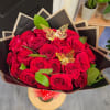Bouquet of red roses with decorative butterfly picks