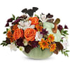Pumpkin-shaped arrangement with orange roses and autumn flowers