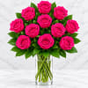 Bouquet of hot pink roses in a clear glass vase