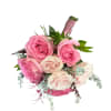 Pink and cream rose bouquet with greenery on a white background
