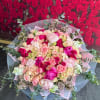 Brighten any space with our Elegant Flower Bouquet! Bursting with vibrant blooms
