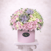 Brighten any space with our Elegant Flower Box Arrangement! Bursting with vibrant