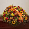 Mixed bouquet with red roses, orange lilies, and yellow sunflowers