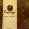 Box of assorted chocolates with a gold label