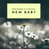 Daisy field with a "New Baby" sign