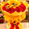 Bouquet of red roses wrapped in bright yellow paper with butterfly accents