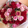 Pretty jewel tones in this gorgeous Rose bouquet packed with the freshest